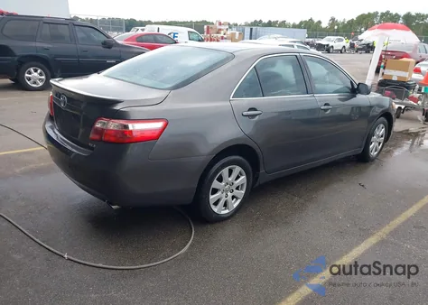 2007 Toyota Camry Xle z USA, uszkodzony, nr VIN JTNBE46K273093358